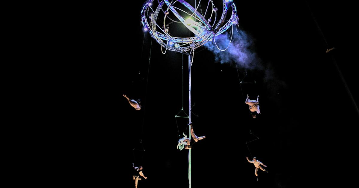 acrobats-performing-on-tower-3506539