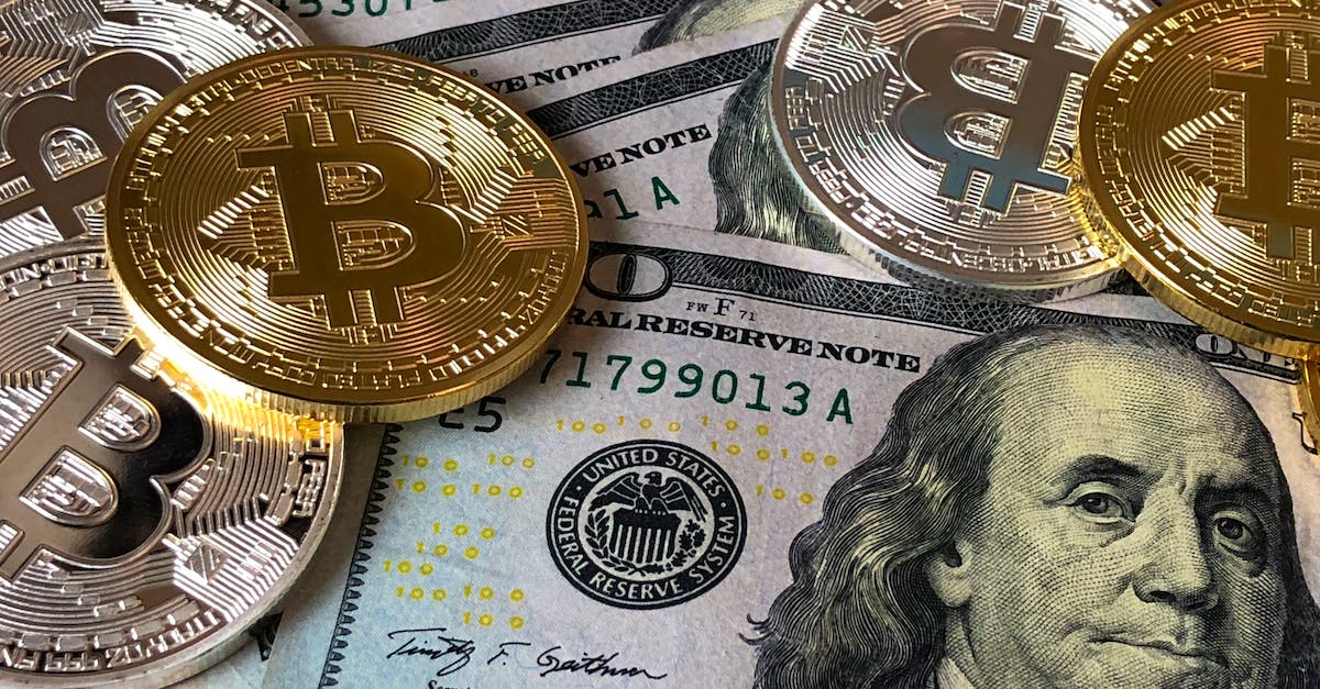bitcoins-and-u-s-dollar-bills-6594228
