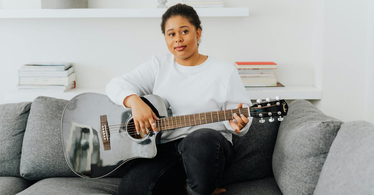 boy-in-white-crew-neck-t-shirt-playing-guitar-5283686