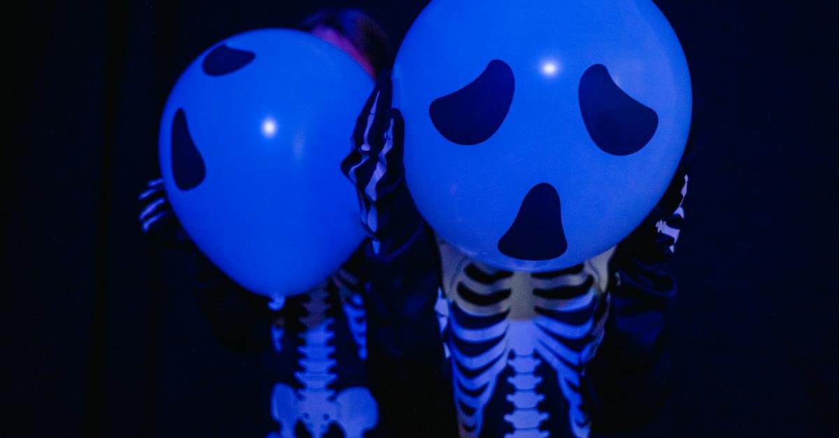 characters-wearing-skeleton-costumes-with-spooky-balloons-imitating-heads-2850453