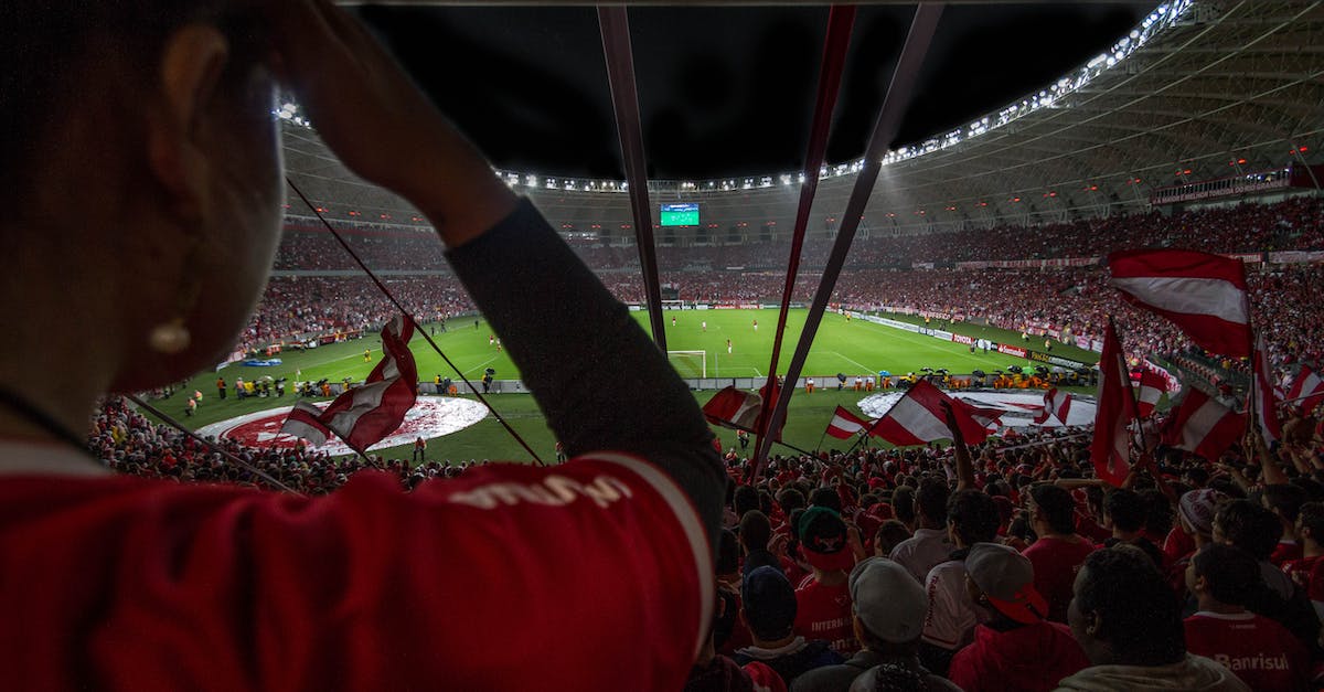 group-of-people-watching-soccer-game-7527650