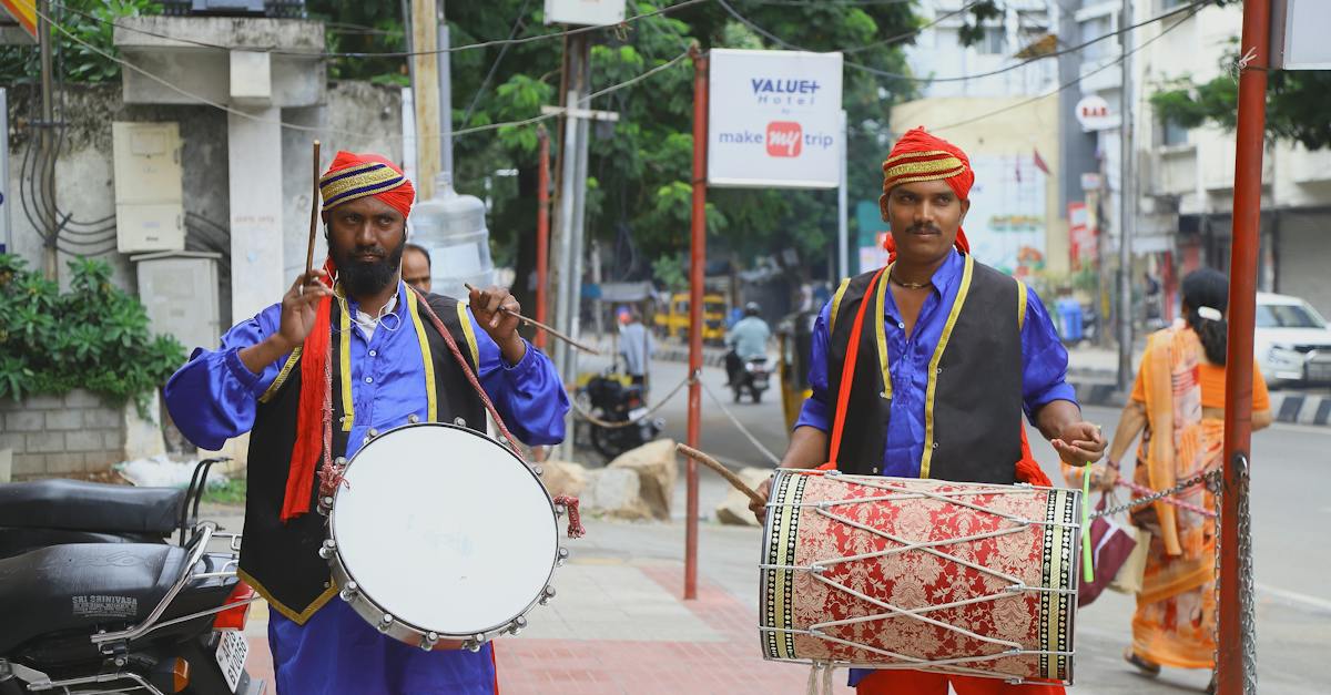 man-holding-percussion-instrument-9896998