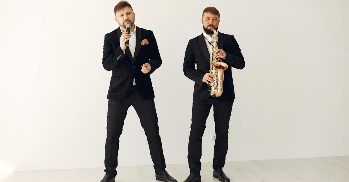 talented-male-artists-in-elegant-concert-suits-performing-with-saxophone-and-microphone-8485312